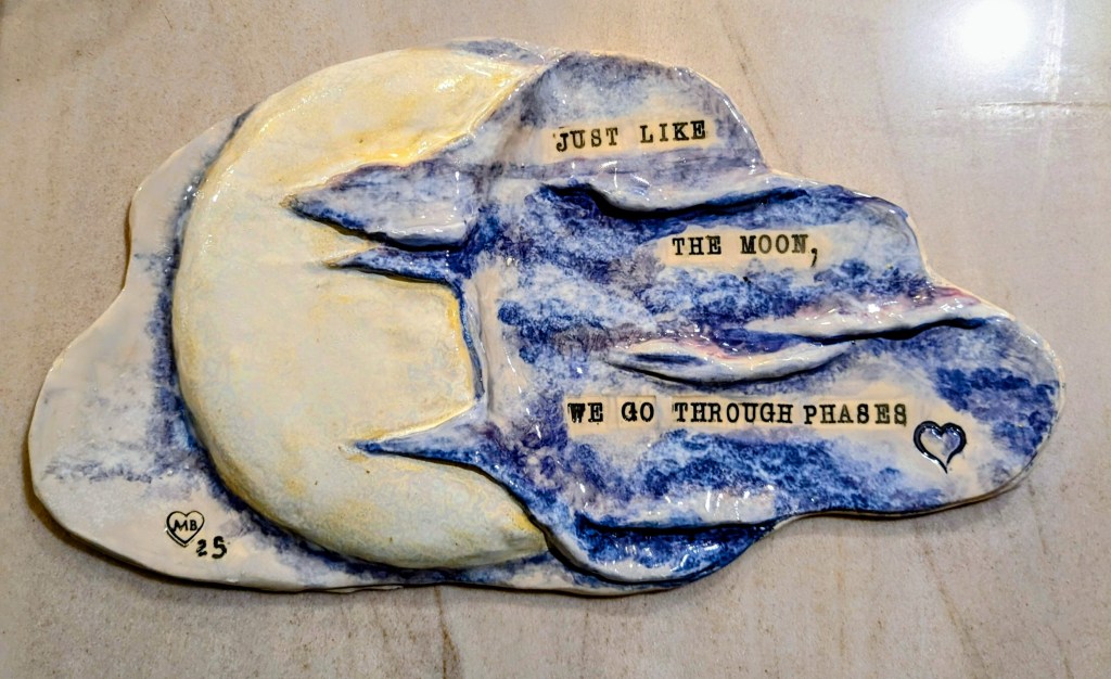 Ceramic artwork titled We Go Through Phases.